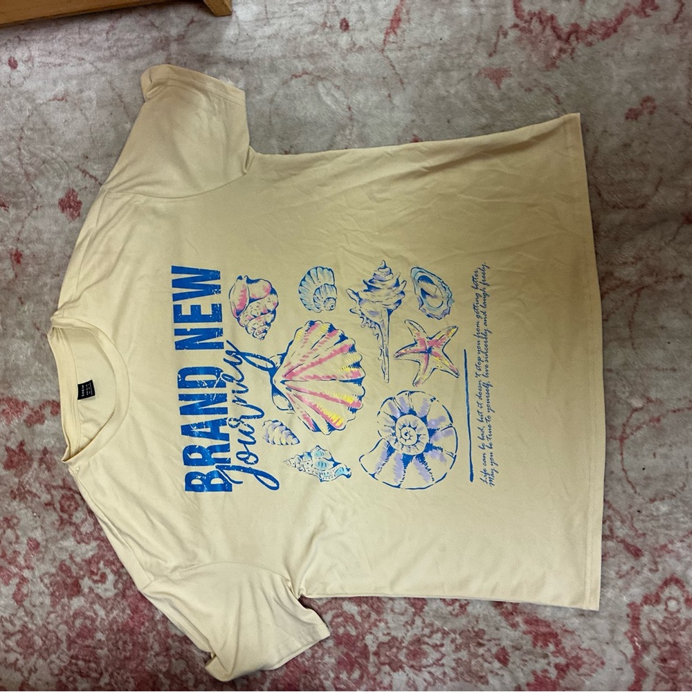 Cream Graphic T-Shirt with Blue and Pink Design